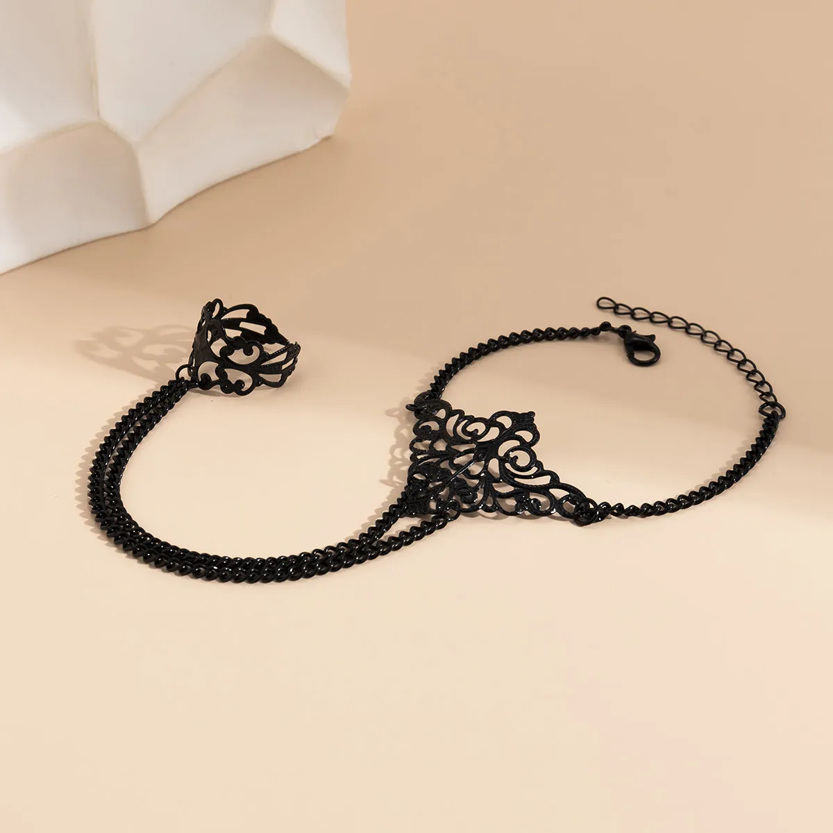 Black-Plated Crown Wrist-To-Ring Bracelet