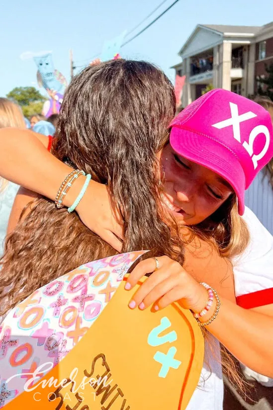 Chi Omega Bold Bid Day Trucker Hat