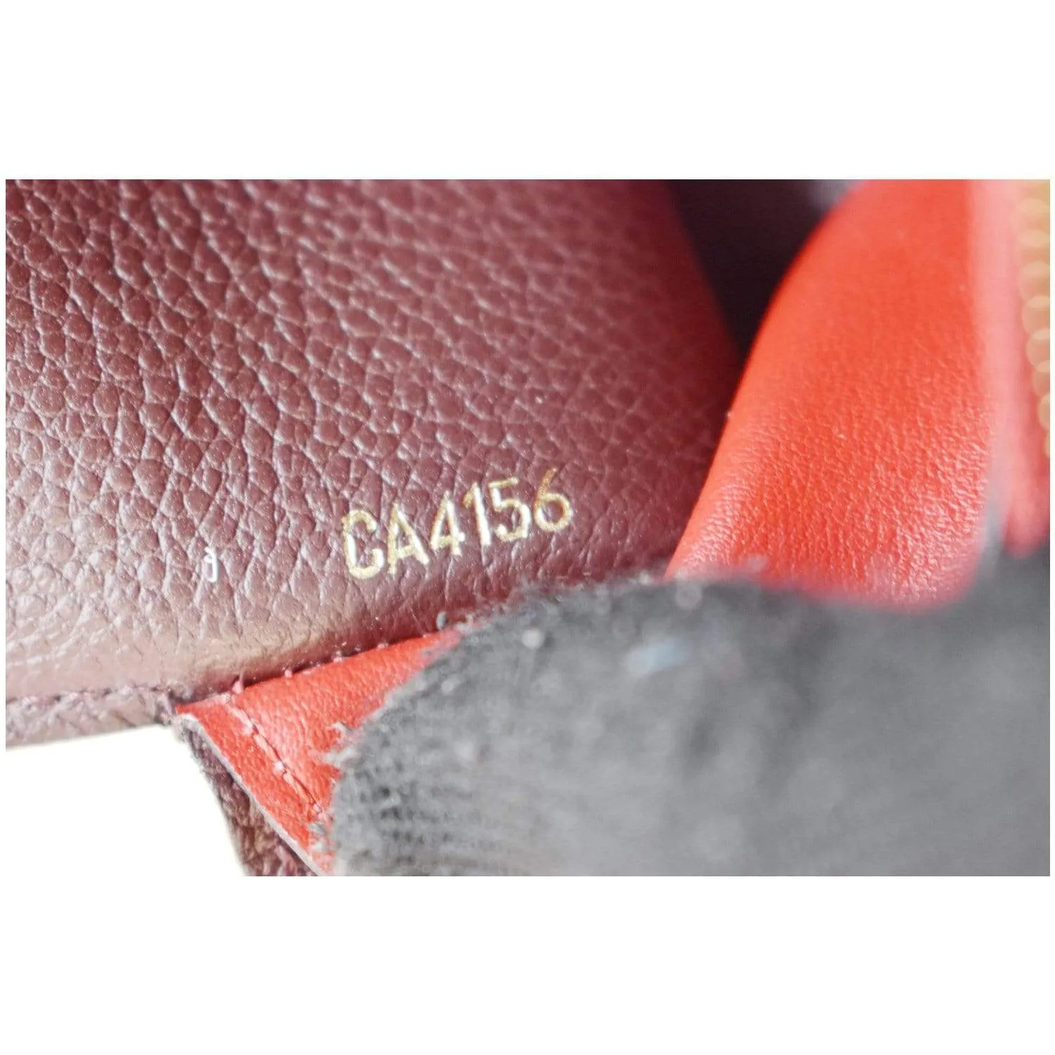 LOUIS VUITTON Emilie Monogram Empreinte Leather Wallet Red