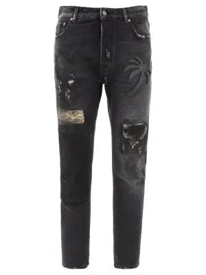 Palm Angels Palm Angels Mid-Rise Distressed Patchwork Jeans